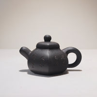 [Six Directions Rongtian] Black gold sand carved calligraphy and painting purple sand teapot