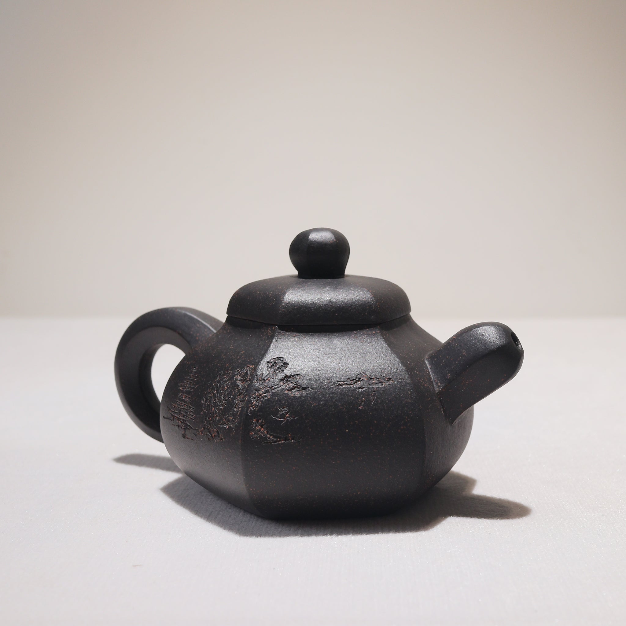 [Six Directions Rongtian] Black gold sand carved calligraphy and painting purple sand teapot