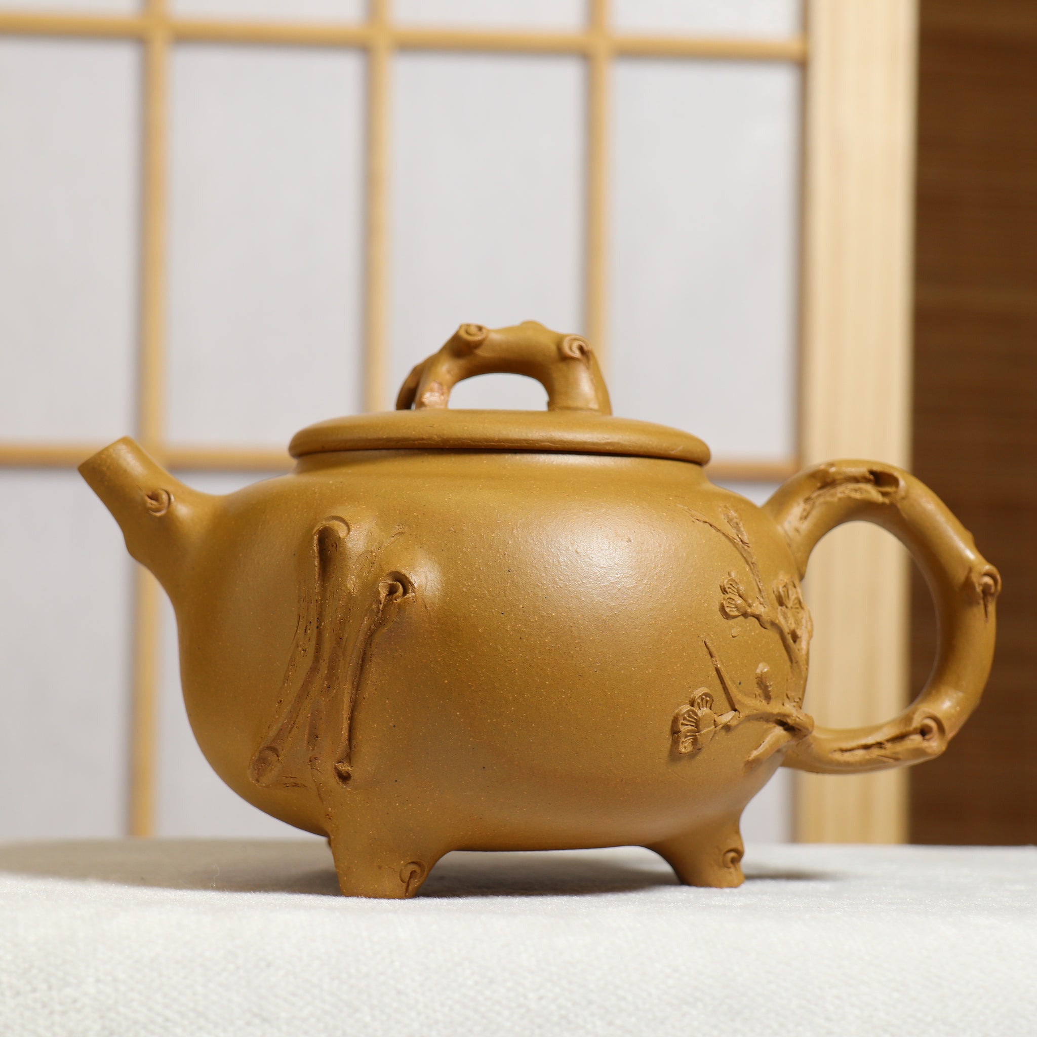 (Sold) [Three-legged plum pile] Fully handmade raw ore yellow mud decal purple clay teapot