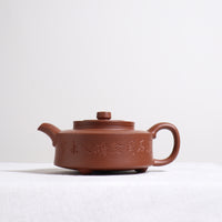 [Three-legged circumferential disk] Downhill mud calligraphy purple clay teapot